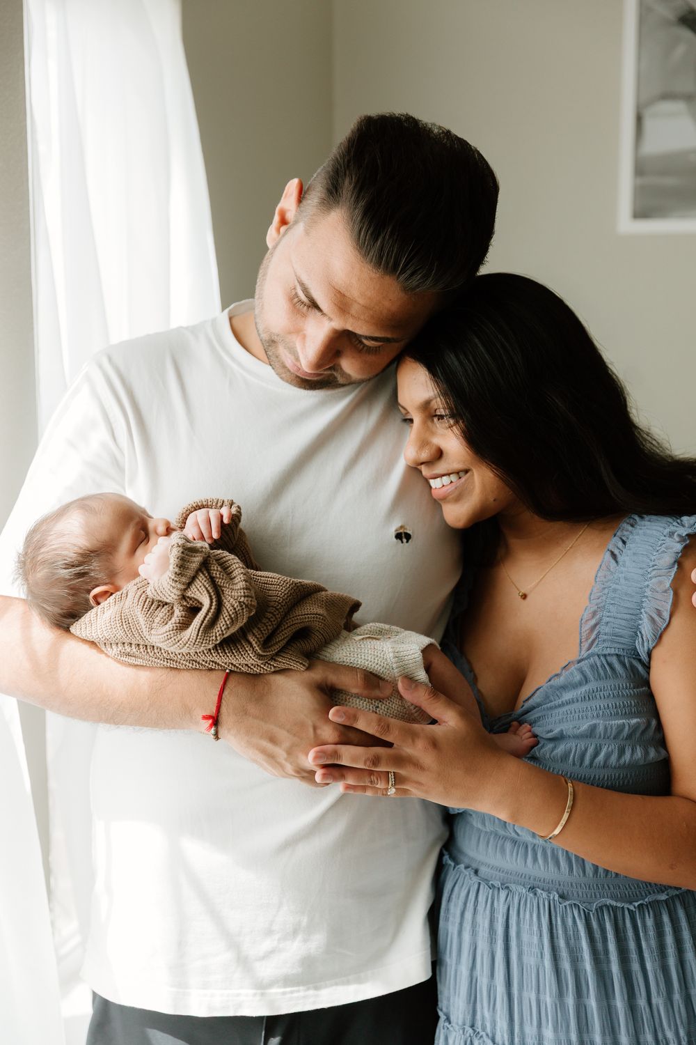 Beautiful family portrait using natural window light during an in-home newborn session in East Texas with Tyler Tx Motherhood Photographer