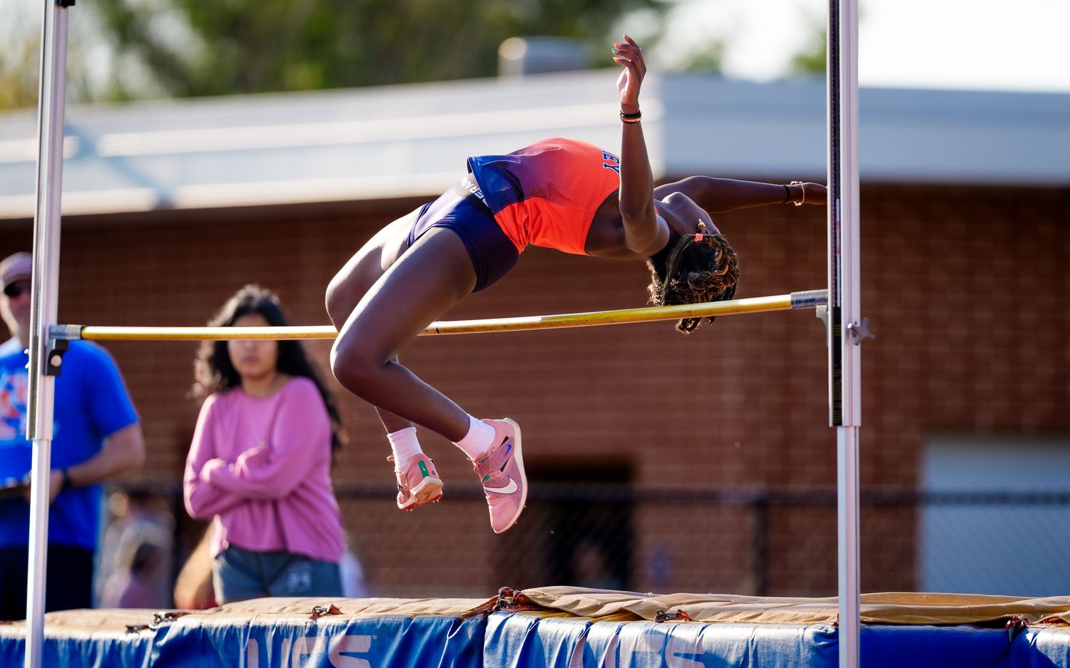 Hershey Trojans high jumper arching over the bar at the Meet of Champions, by Deanna Fox, SportsFox Photography, Hershey PA