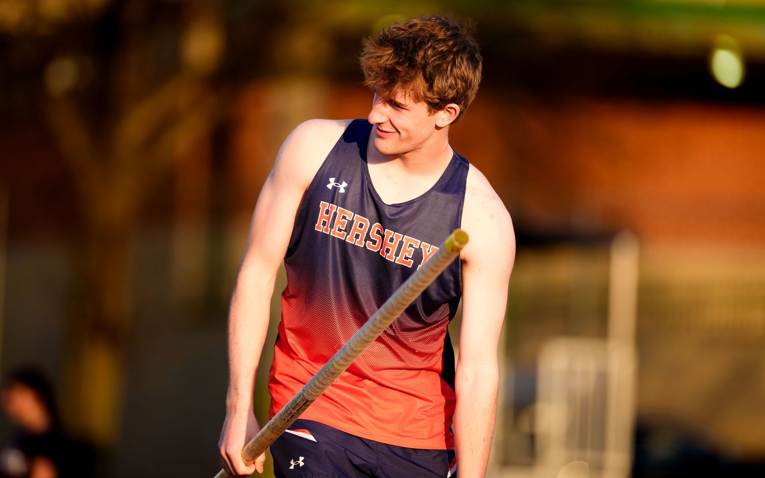 Hershey Trojans pole vaulter preparing to compete, Meet of Champions, by Deanna Fox, SportsFox Photography, Hershey PA