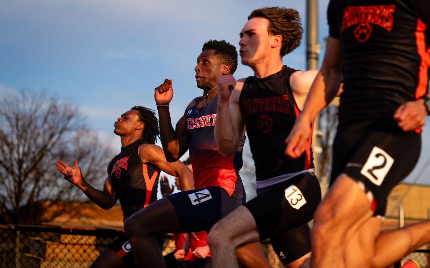 Hershey Trojans sprinters battling at the start of a race, Meet of Champions, by Deanna Fox, SportsFox Photography, Hershey PA