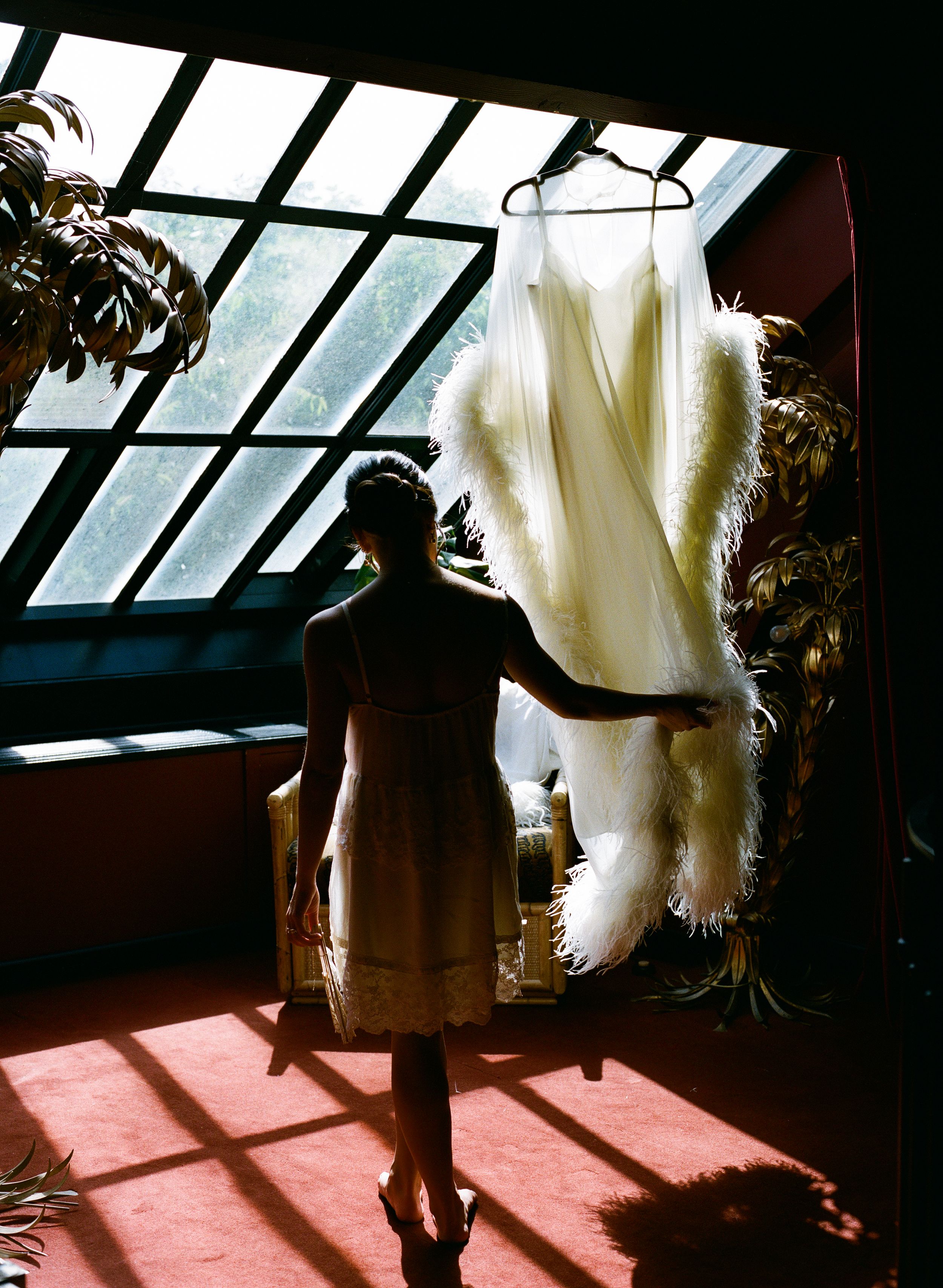 hotel particulier montmartre wedding, paris wedding, paris film wedding photographer, paris bridal suite, feather dress bride, film