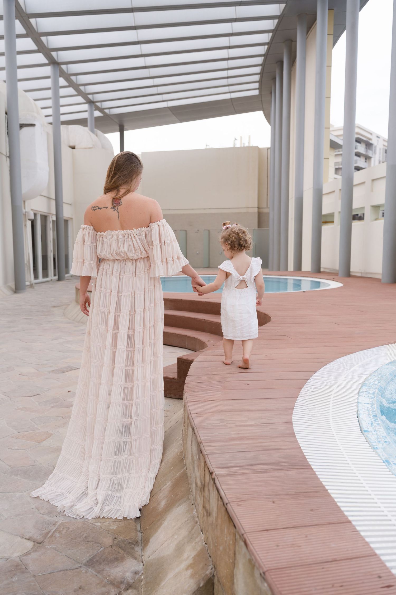 park photoshoot in abu dhabi clinet closet options cream dress white
