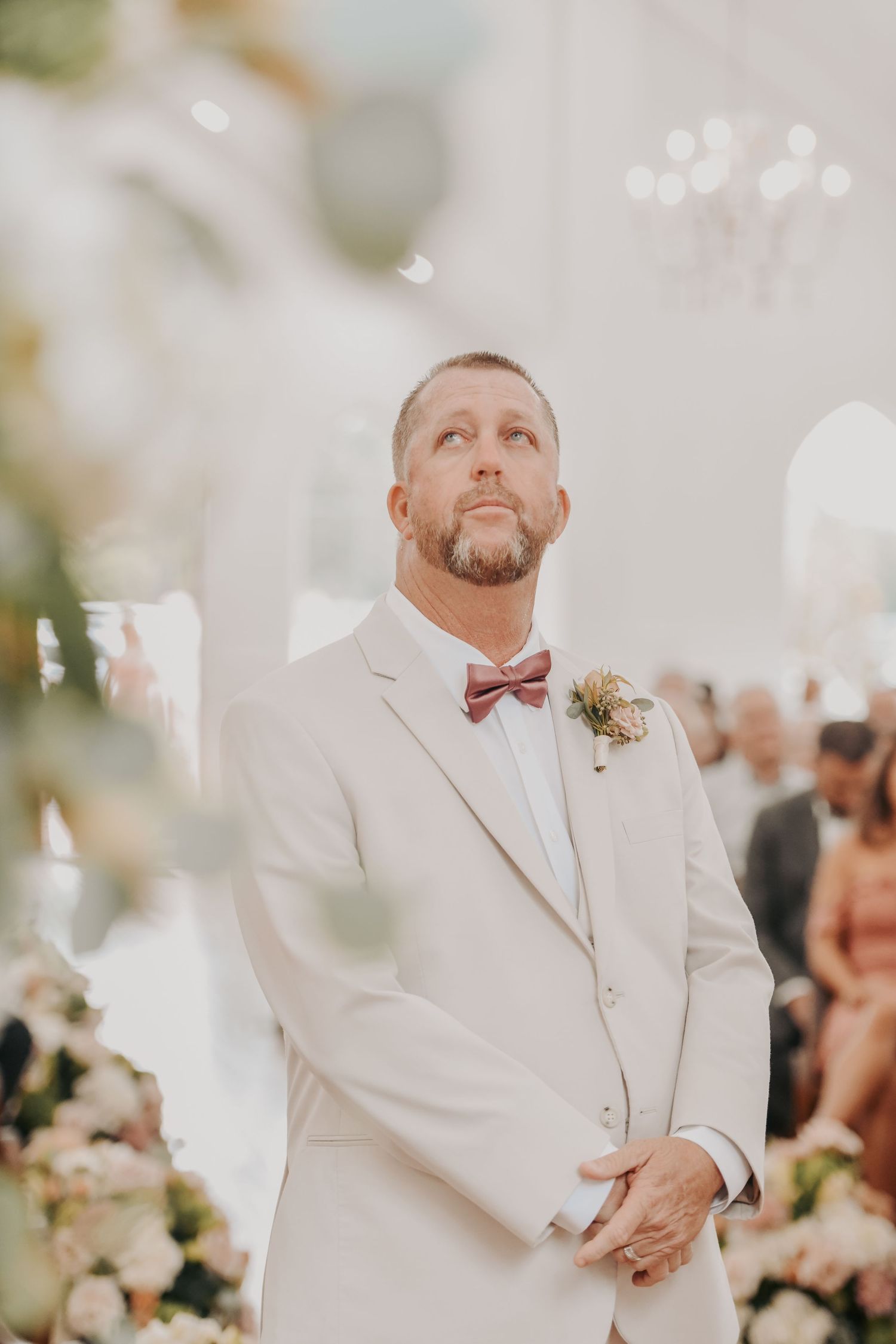 Groom listening to a song written about the couple's life together before the wedding