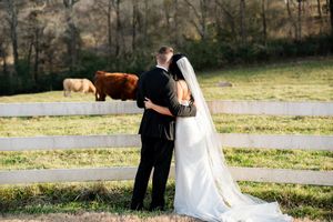 A romantic wedding sequence shows a couple dancing and embracing in a sunlit outdoor setting.