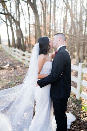A series of romantic wedding portraits showing a couple kissing in a wooded outdoor setting with sunlight.