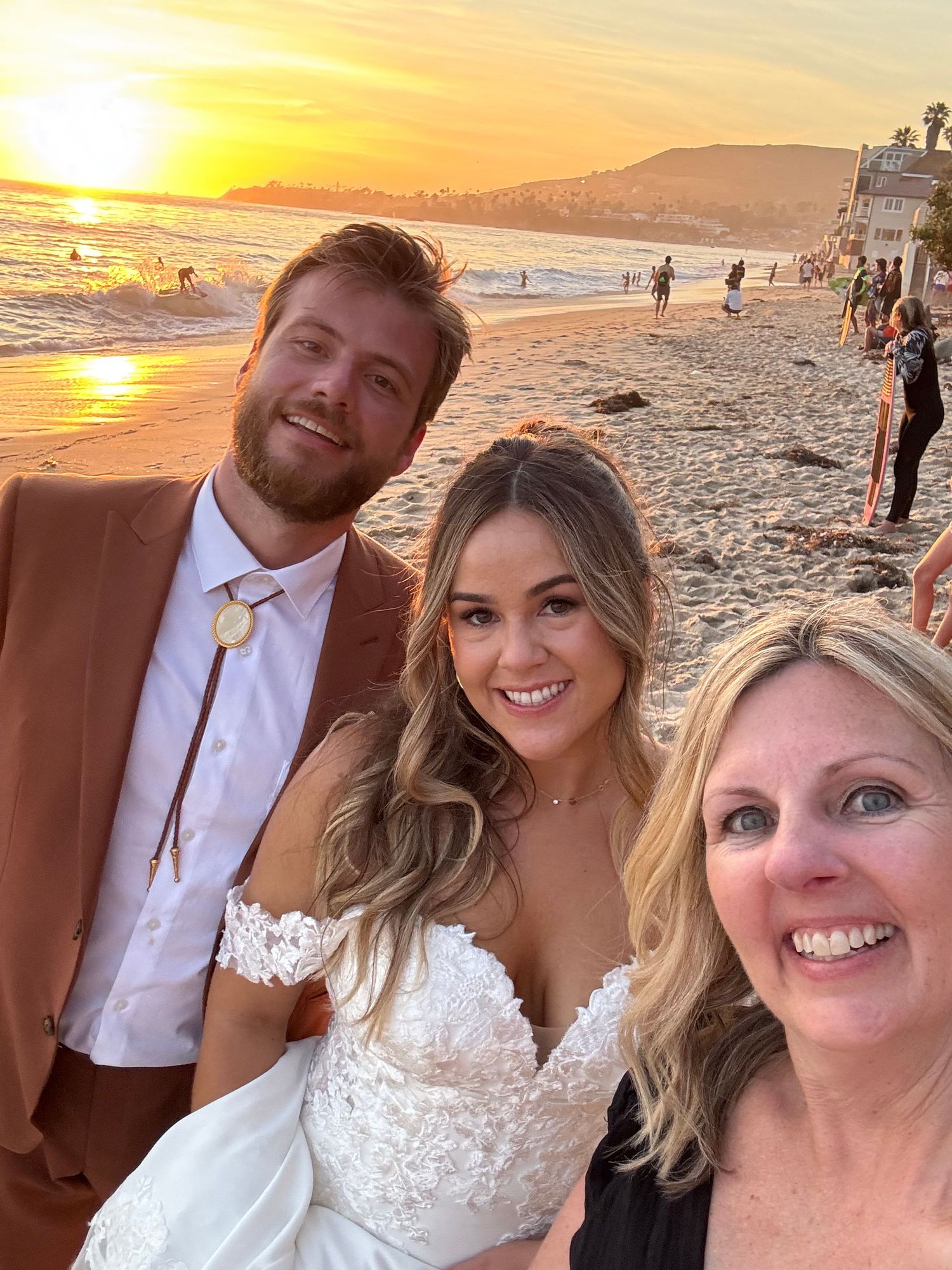 Golden hour selfie with the bride and groom in Laguna Beach