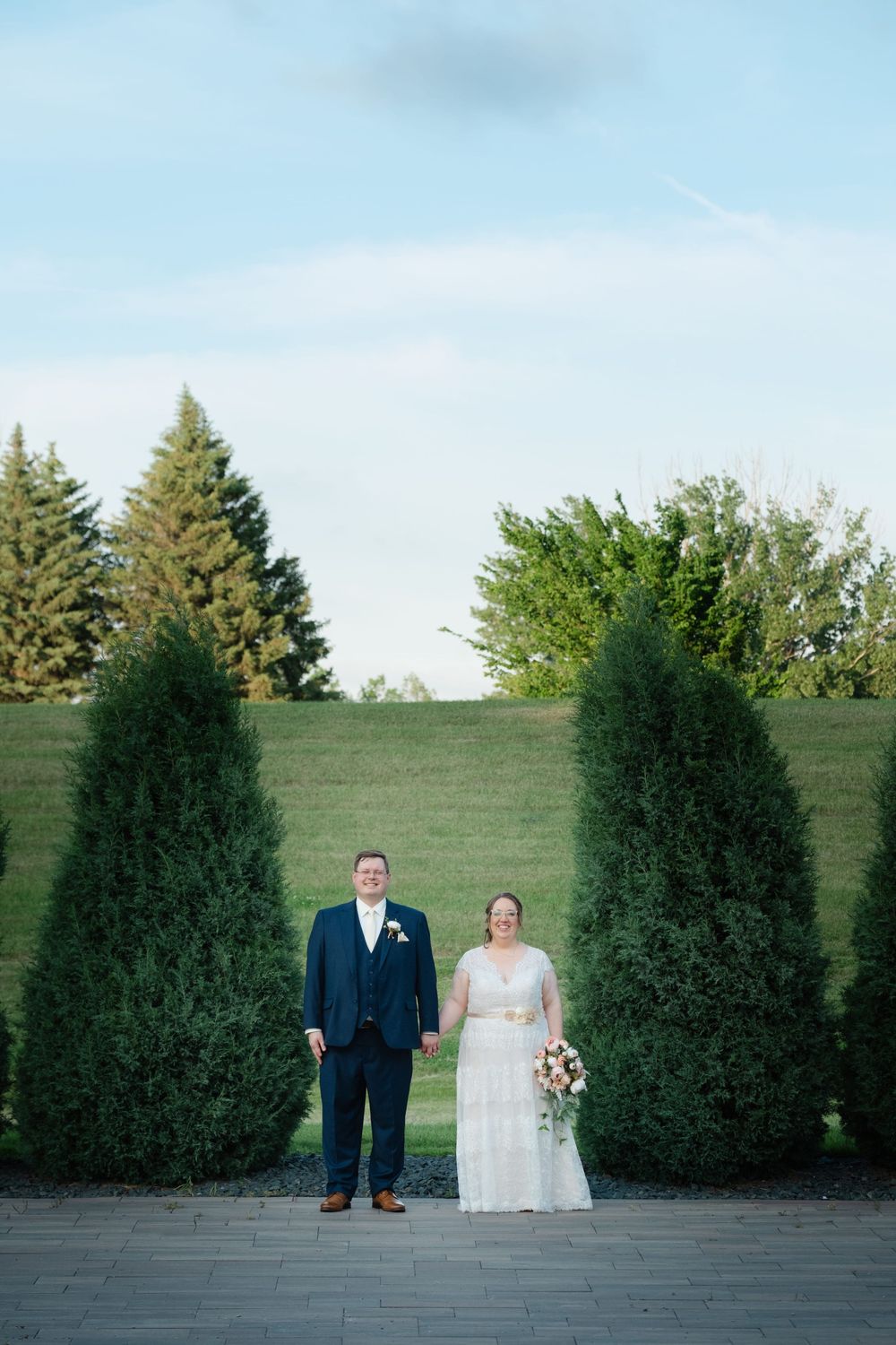 Preston and Danielle outdoor wedding ceremony in North Dakota by GMB Photo and Design