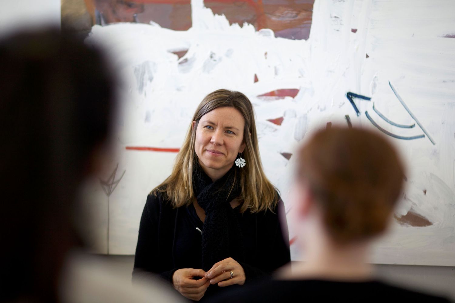 A series of progressive images showing someone giving an engaging presentation in front of a white board.