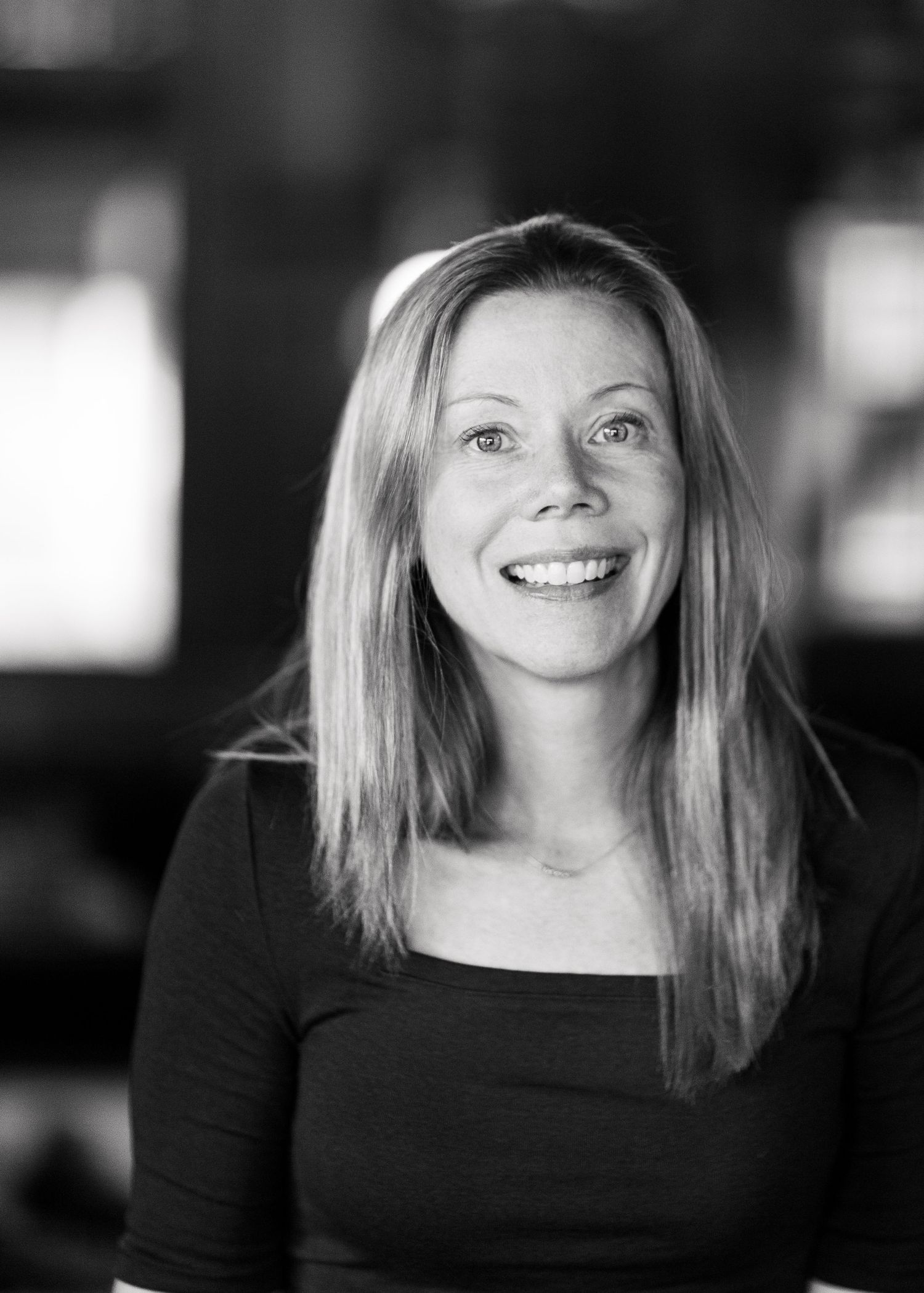 A black and white portrait series showing different expressions.