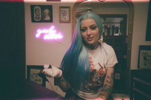 Series of candid moments captured in moody lighting with neon accents.