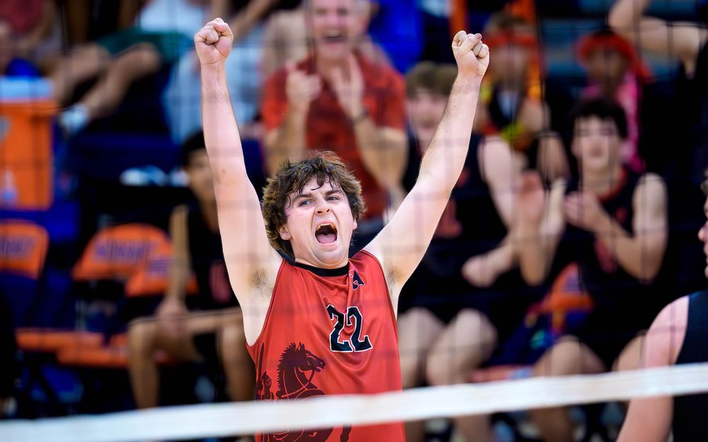 Hempfield player celebrates vs Cumberland Valley, PIAA boys volleyball semifinals by Deanna Fox, SportsFox Photography based in Hershey PA.