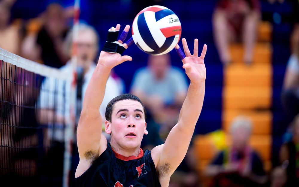 Hempfield setter pops a set vs Cumberland Valley, PIAA boys volleyball semifinals by Deanna Fox, SportsFox Photography based in Hershey PA.