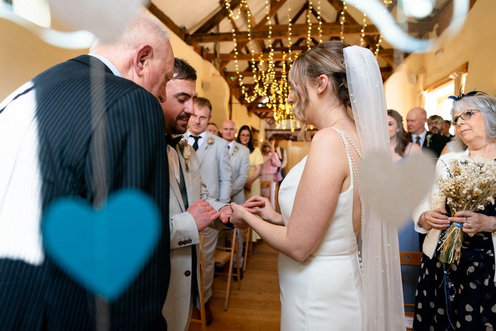 Wedding ring exchange Corn Barn Devon Wedding