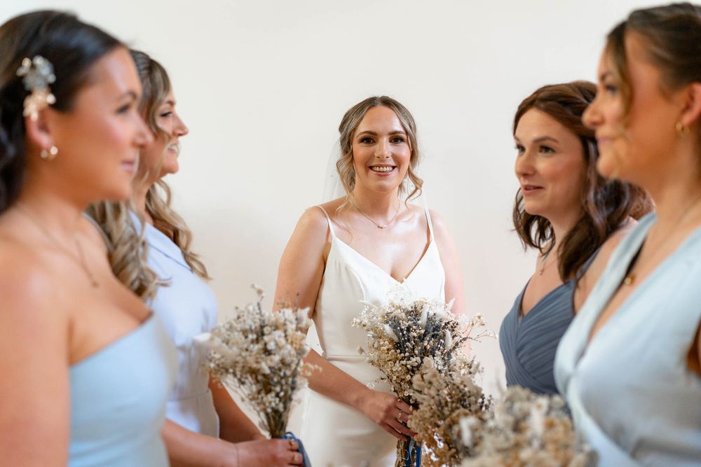 Birde and bridesmaids at a Corn Barn Devon Wedding