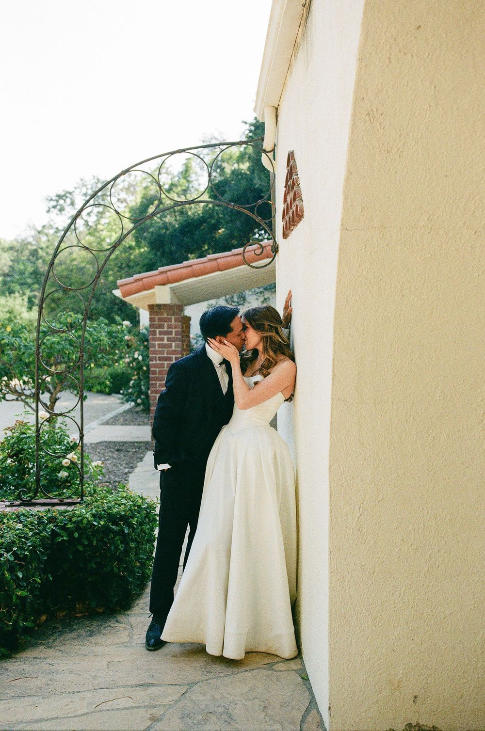 A raw, candid film capture of emotional wedding moments, showcasing a documentary style for garden weddings in Charlotte.