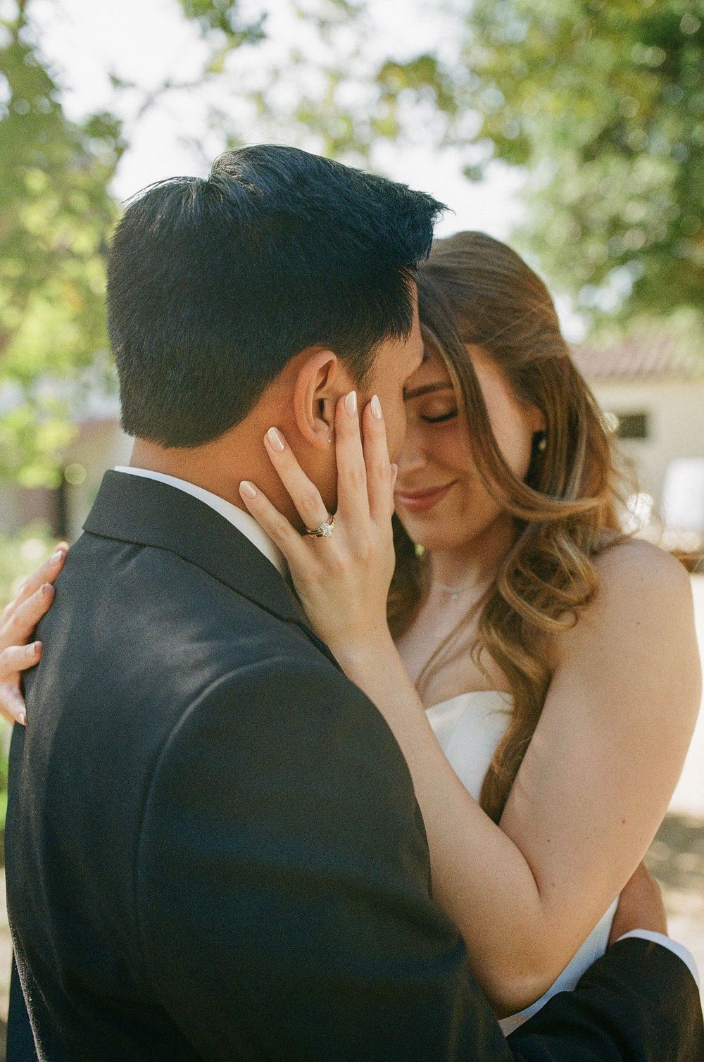 An editorial, grainy film capture of an intimate outdoor wedding ceremony setup, showcasing the natural light work of NC photographer.