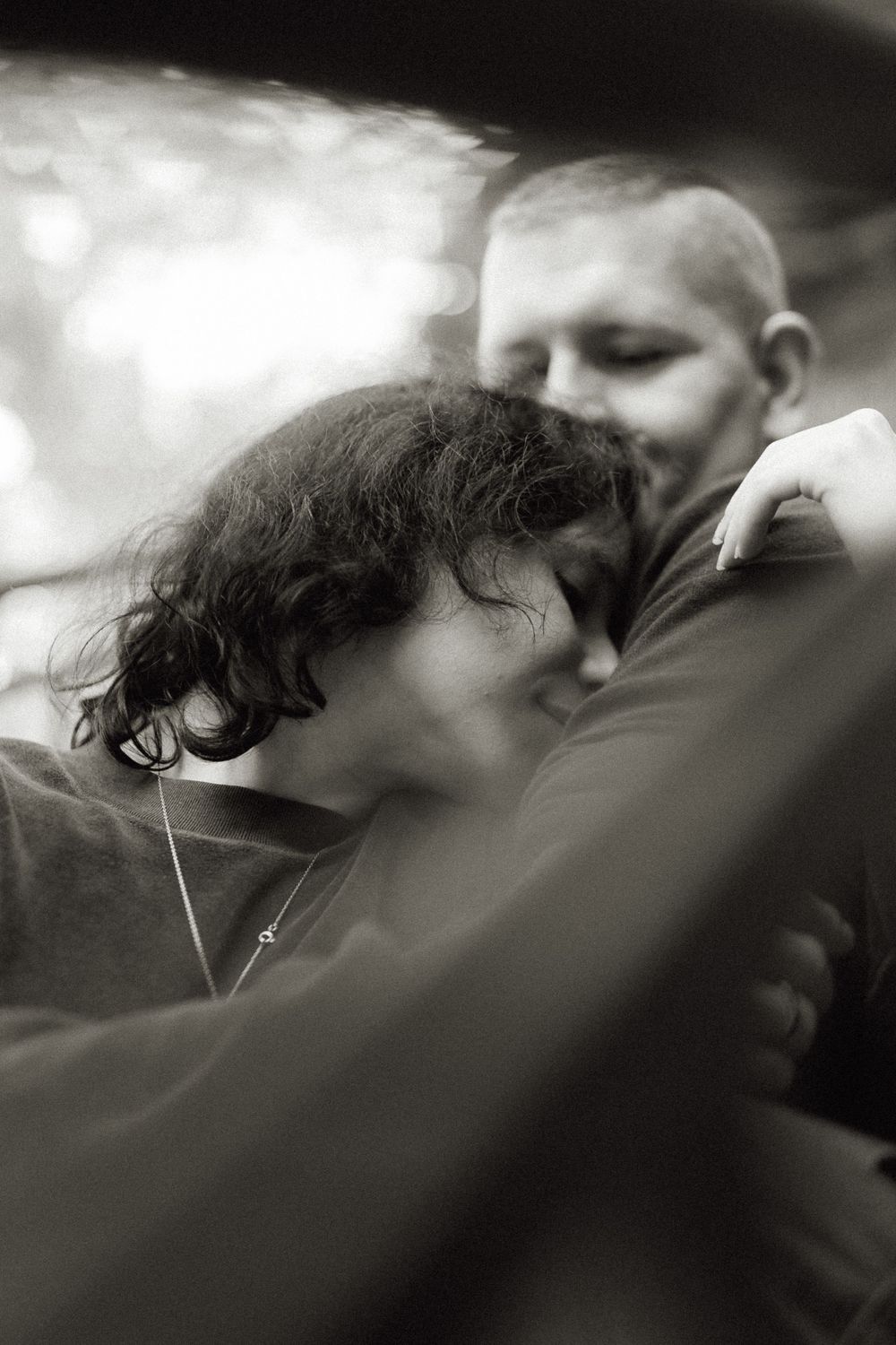 Dreamy black and white close-up photo capturing an intimate moment.