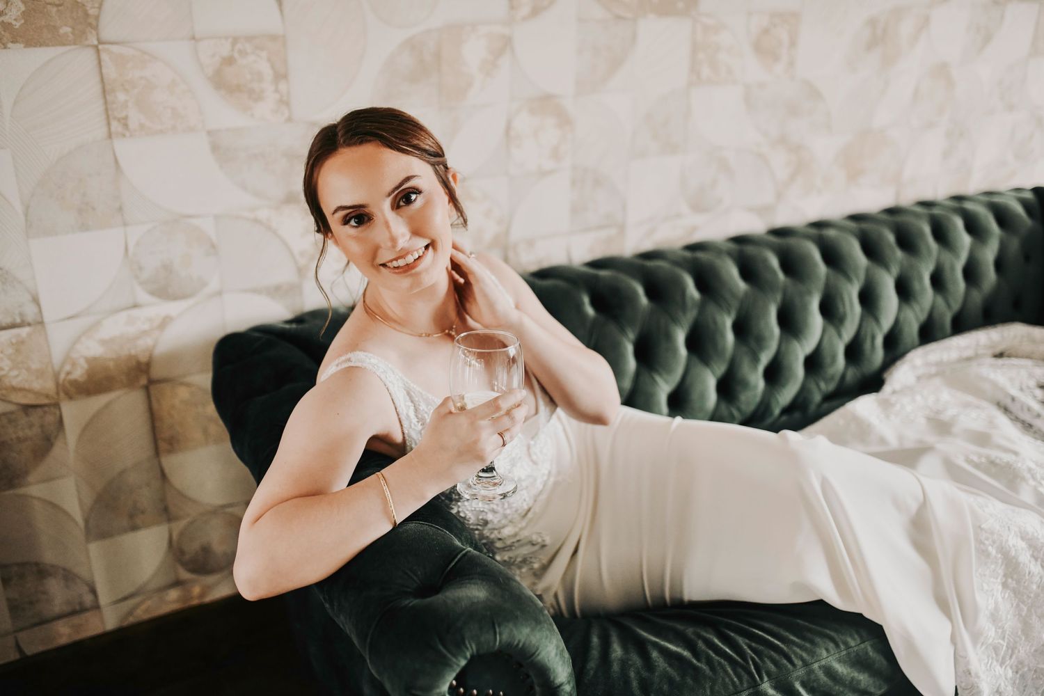 Bride posing indoors near the wedding venue for timeless bridal portraits before the ceremony begins.