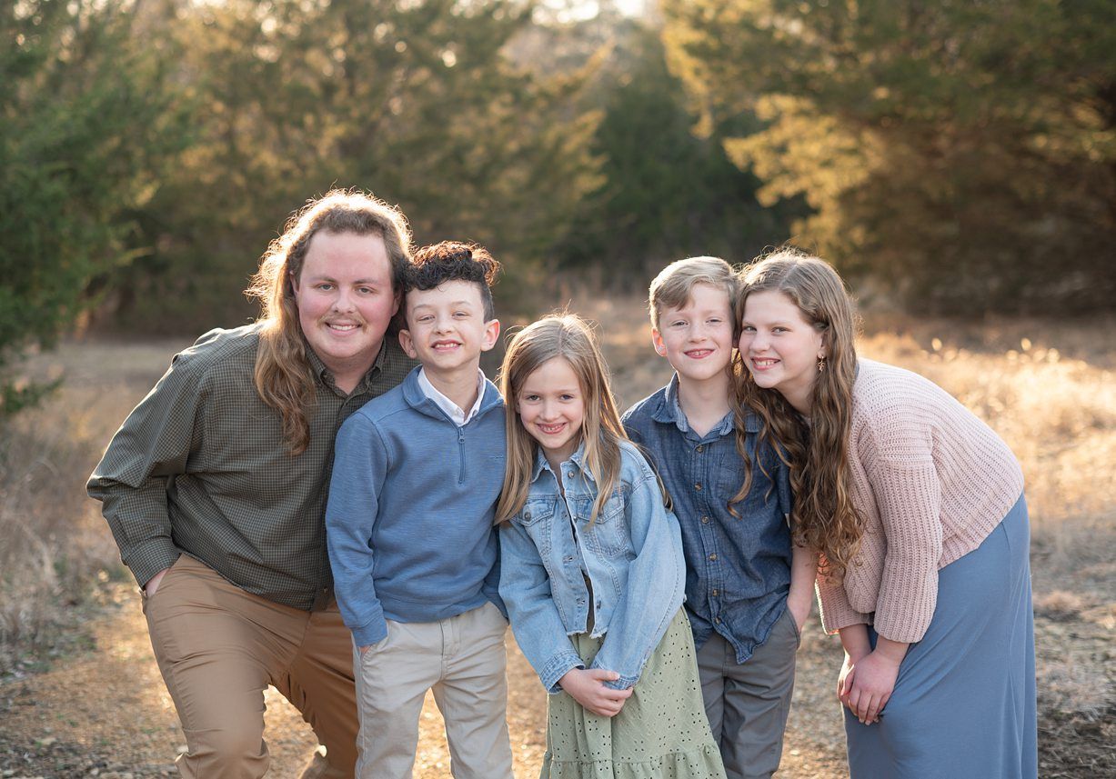 Extended Family Session in Field of Evergreens by Bartlesville Family Photographer Kristi Bray Photography