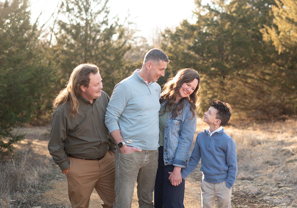 Extended Family Session in Field of Evergreens by Bartlesville Family Photographer Kristi Bray Photography
