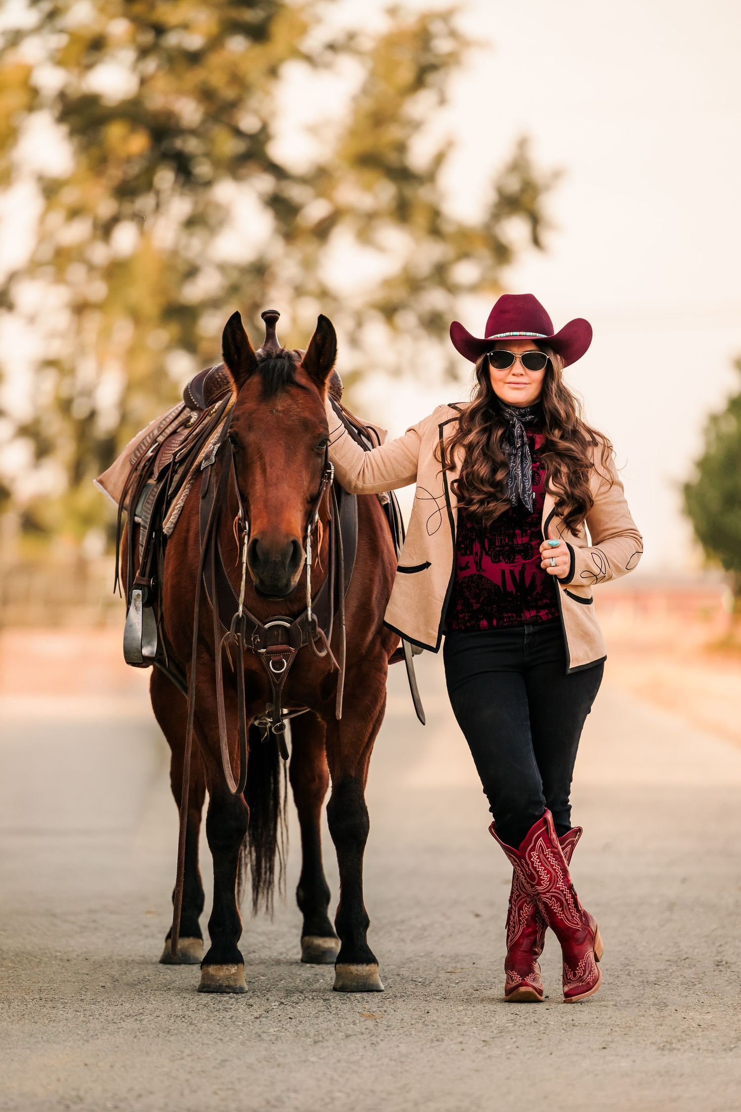 Cowgirl and her horse wearing high fashion western outfit captured by Lauren Ann Photography, Northern California Equine Photographer