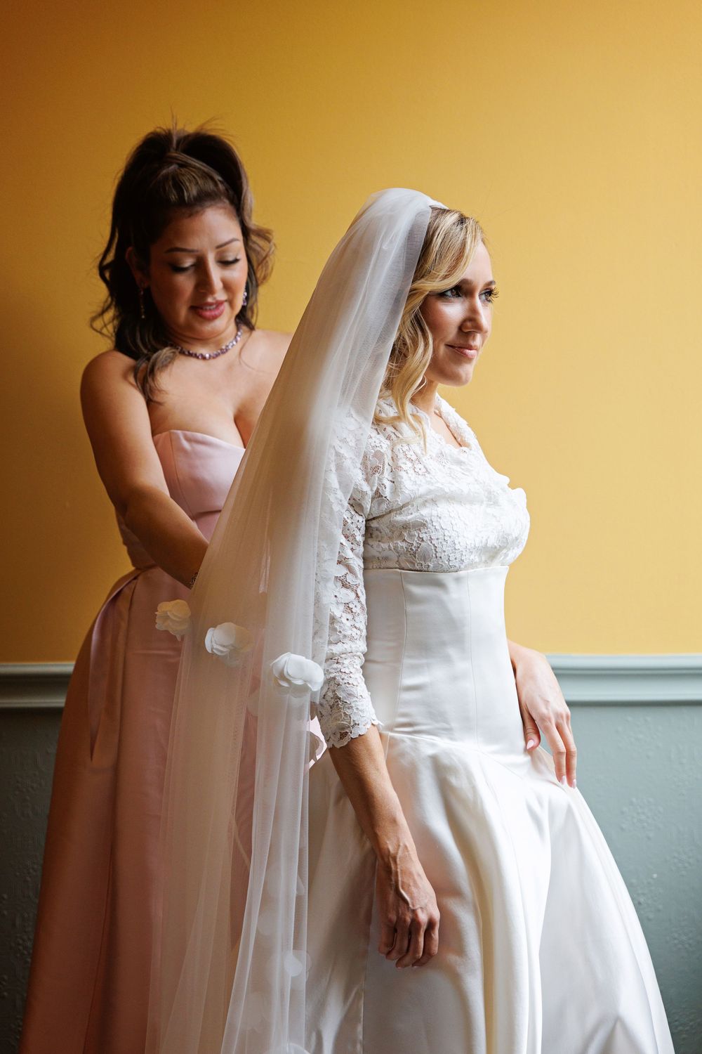 emotional moment with bride and bridesmaids getting ready Houston wedding