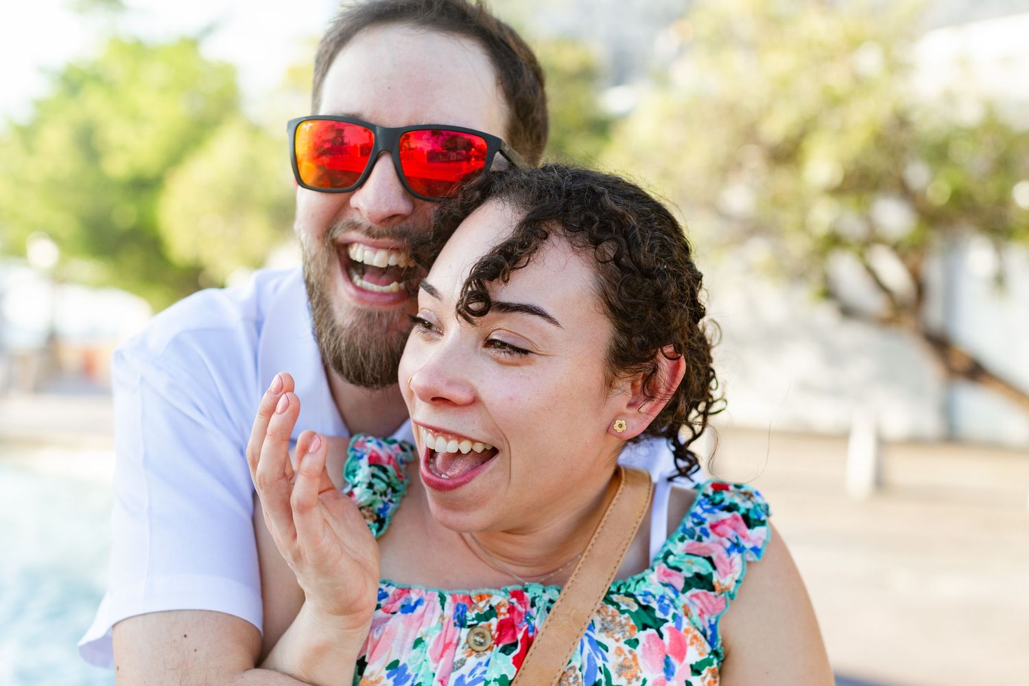 Couples portrait. Marriage proposal at Fuente Raíces in Old San Juan, Puerto Rico.