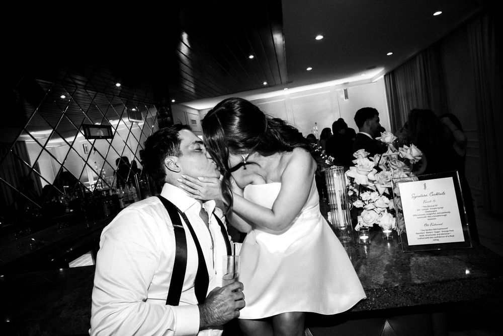 Black and white photo series showing a couple's romantic moments and tender interactions at what appears to be a wedding.