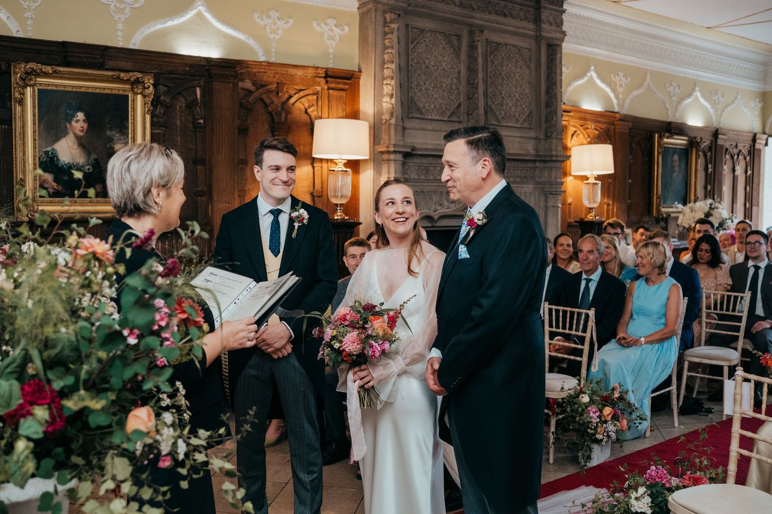 Wedding ceremony photos showing emotional moments and celebrations in an elegant indoor venue.