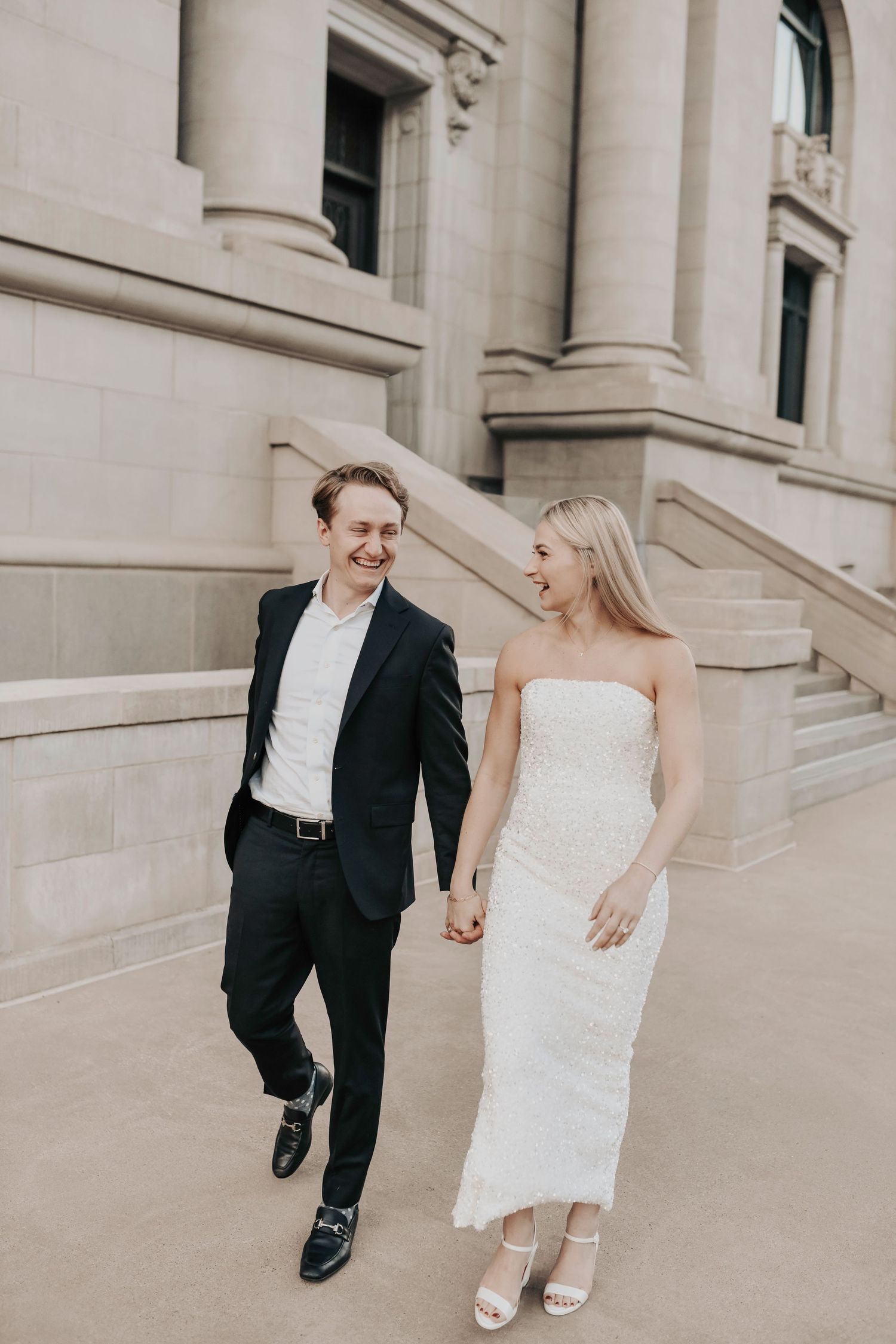 Storytelling engagement photos of couple in Dallas arts district with historic charm