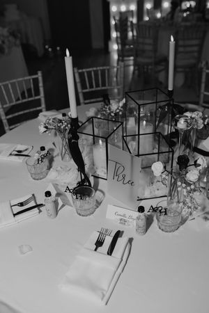 Black and white photo series of elegant wedding reception table settings with floral centerpieces and place settings.