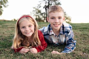 Candid facial close-up portrait of a brother and sister