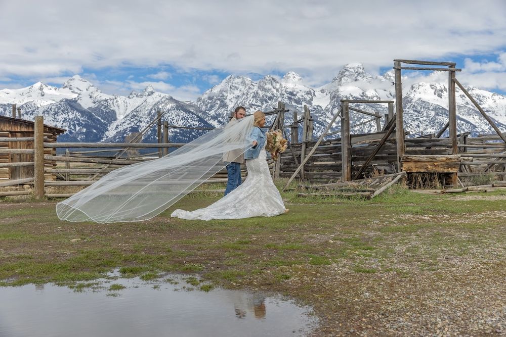 romantic wedding couple with mountains in a background