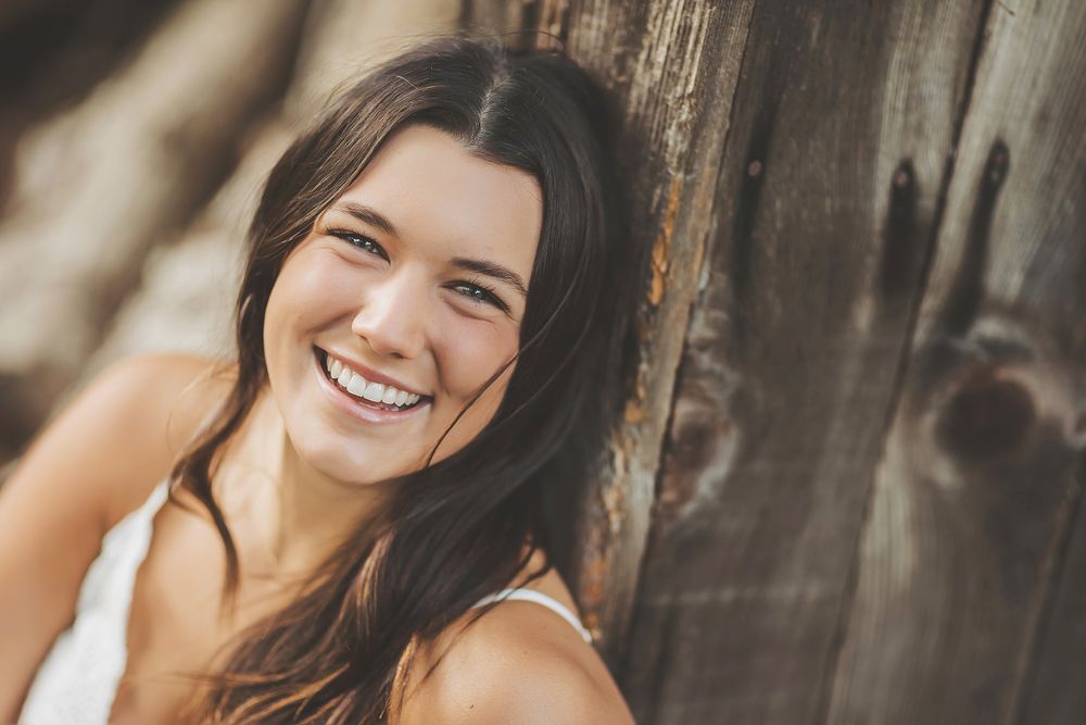 Candid outdoor photography series showing genuine smiles and natural poses.