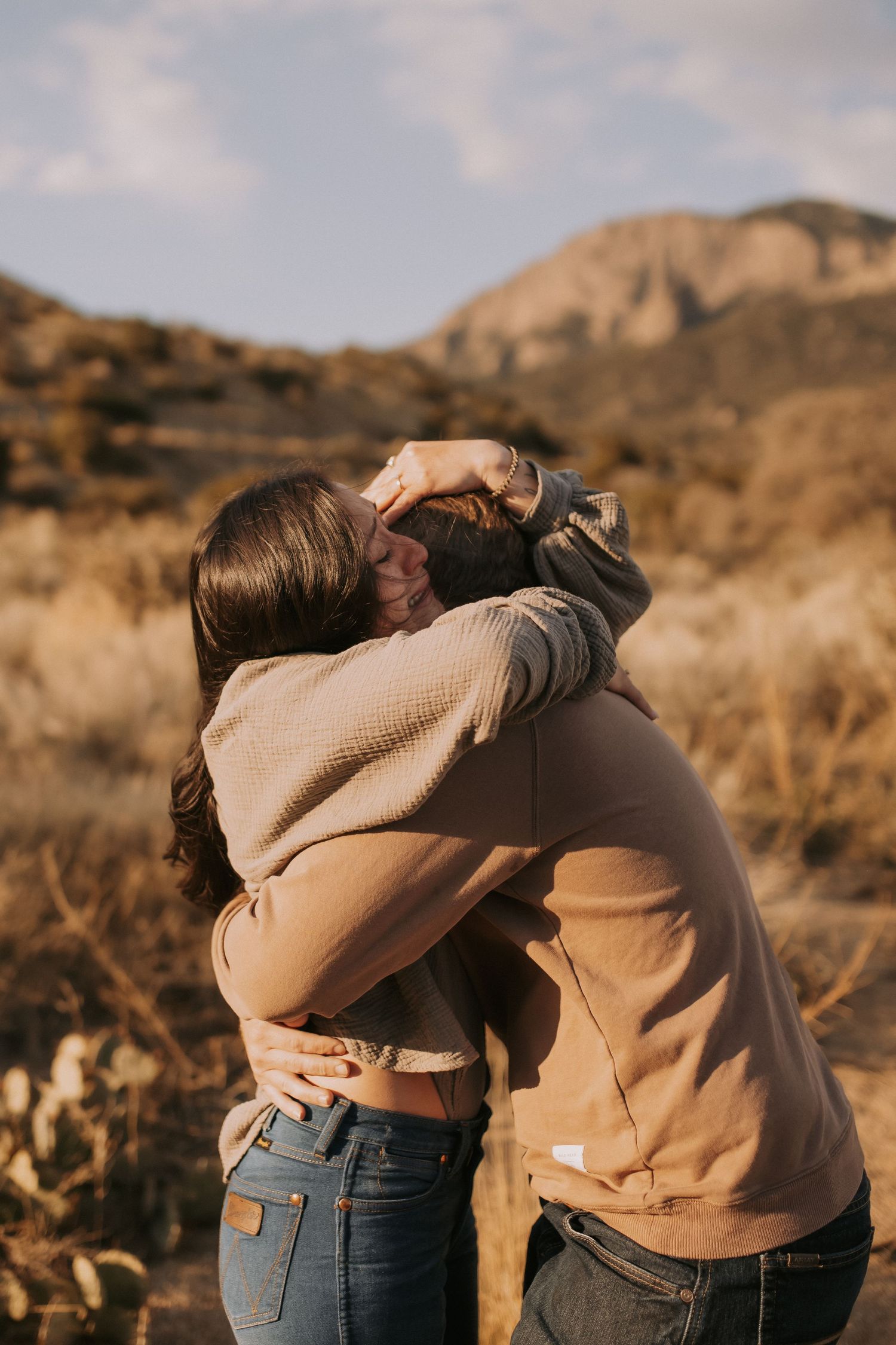 Engagement photographers in albuquerque with desert views. Real proposal story sandia mountains. New Mexico surprise proposal. Desert lovers