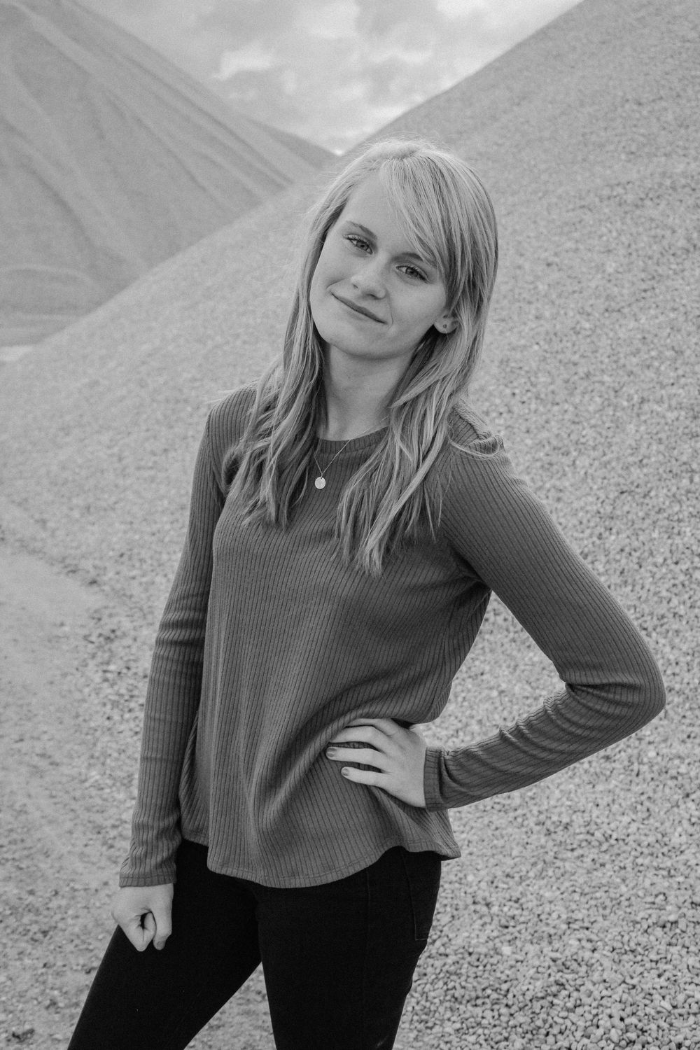 Senior girl during her senior session at gravel pits in Holland, MI.