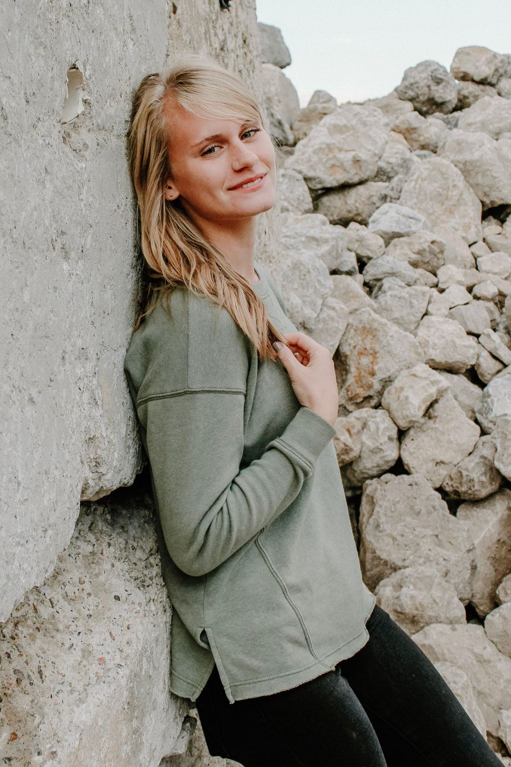 Senior girl during her senior session at gravel pits in Holland, MI.