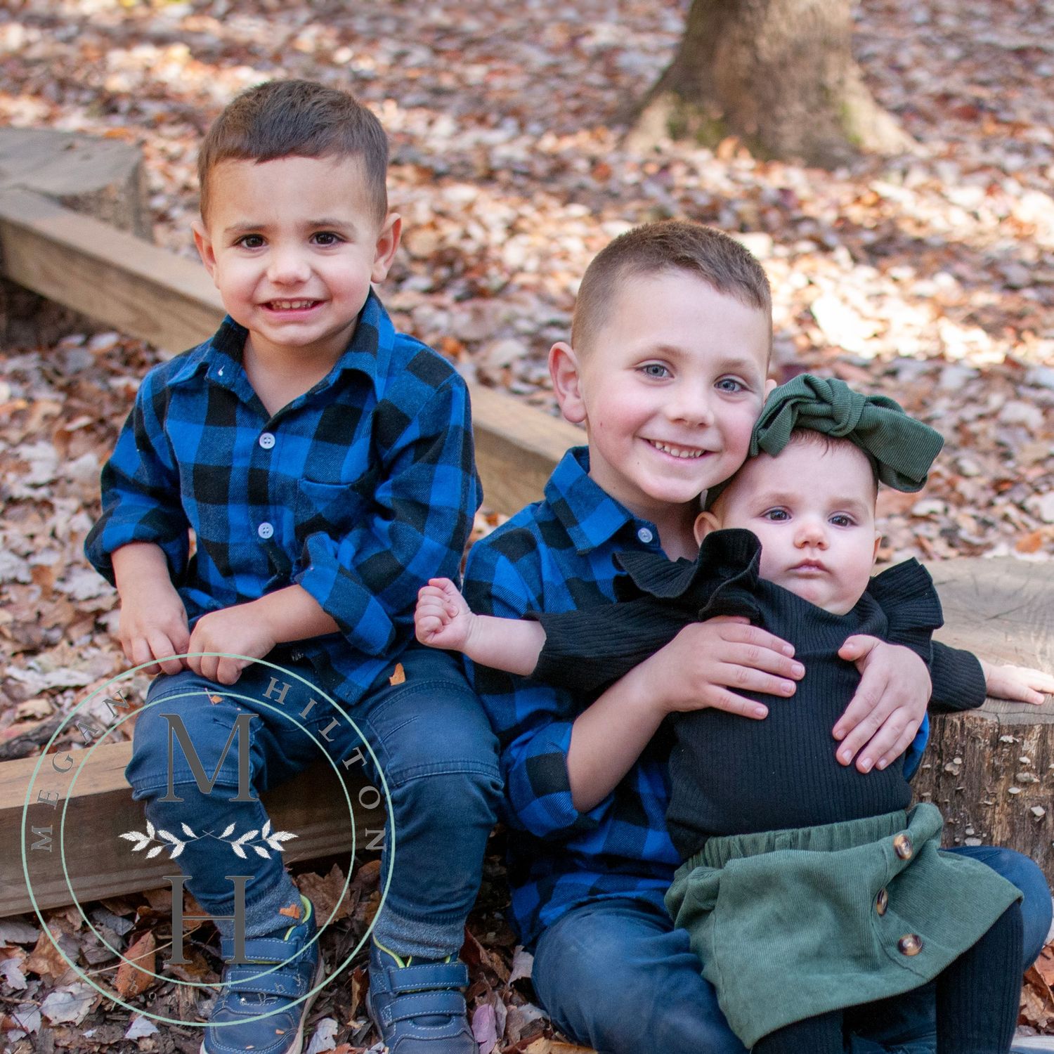Three young siblings together picture