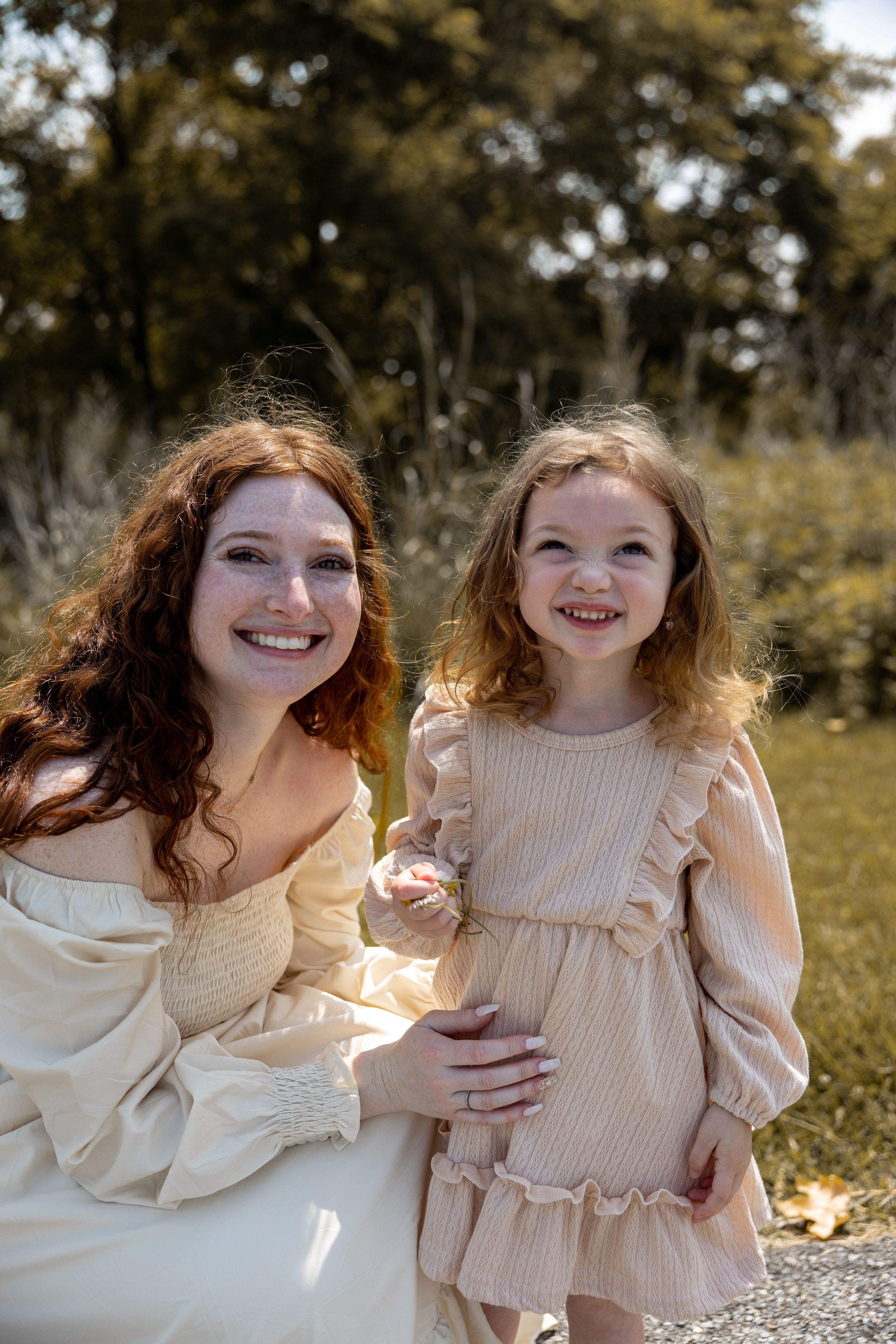 A tender and playful series of candid moments between two individuals in cream-colored outfits against a sunny outdoor backdrop.