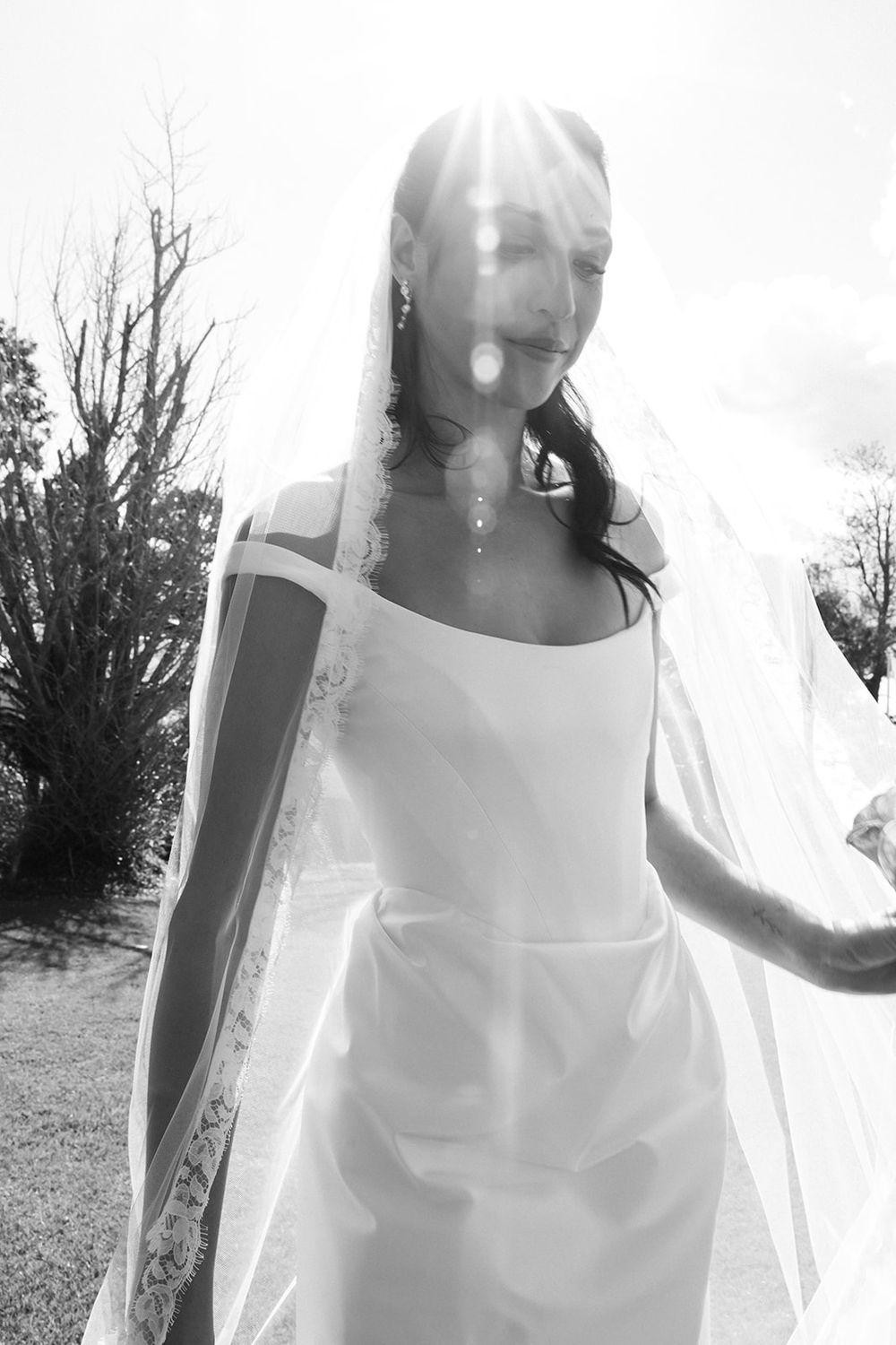 A series of high contrast black and white ethereal photos showing a figure in white against a bright background.