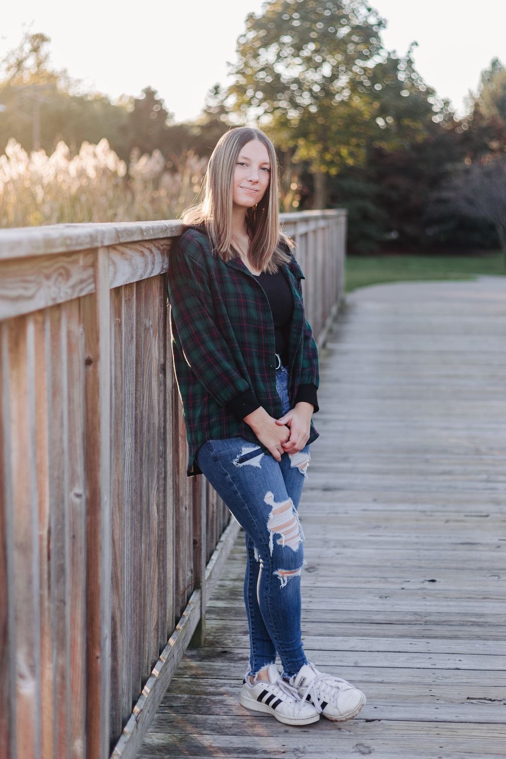senior photo on bridge