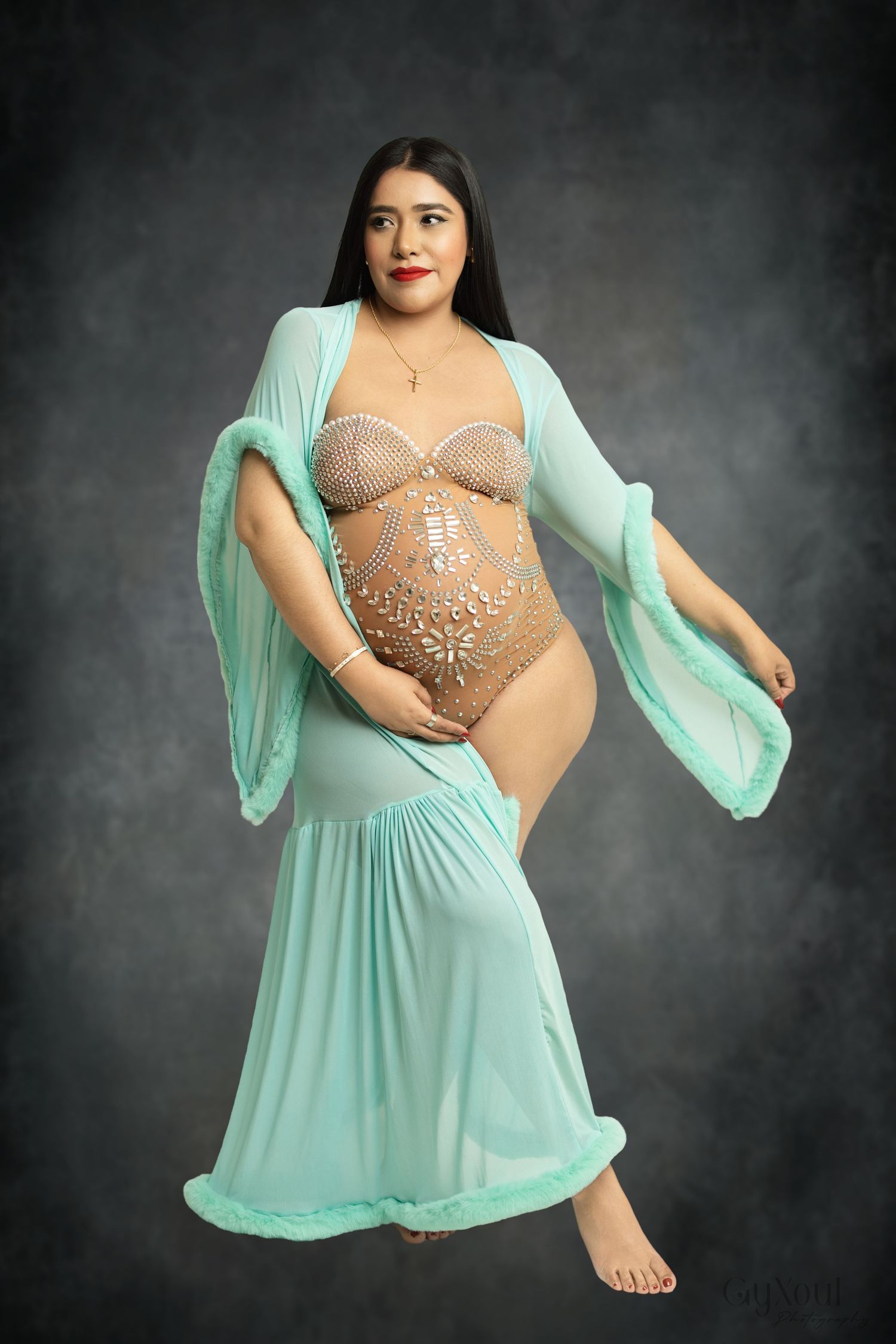 A multi-panel photo sequence shows a flowing mint green maternity gown with a nude embellished bodice in studio lighting.