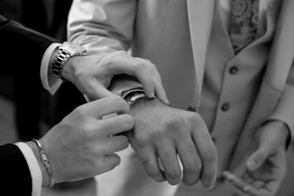 Cropped views of hands performing different therapeutic massage techniques on body parts.