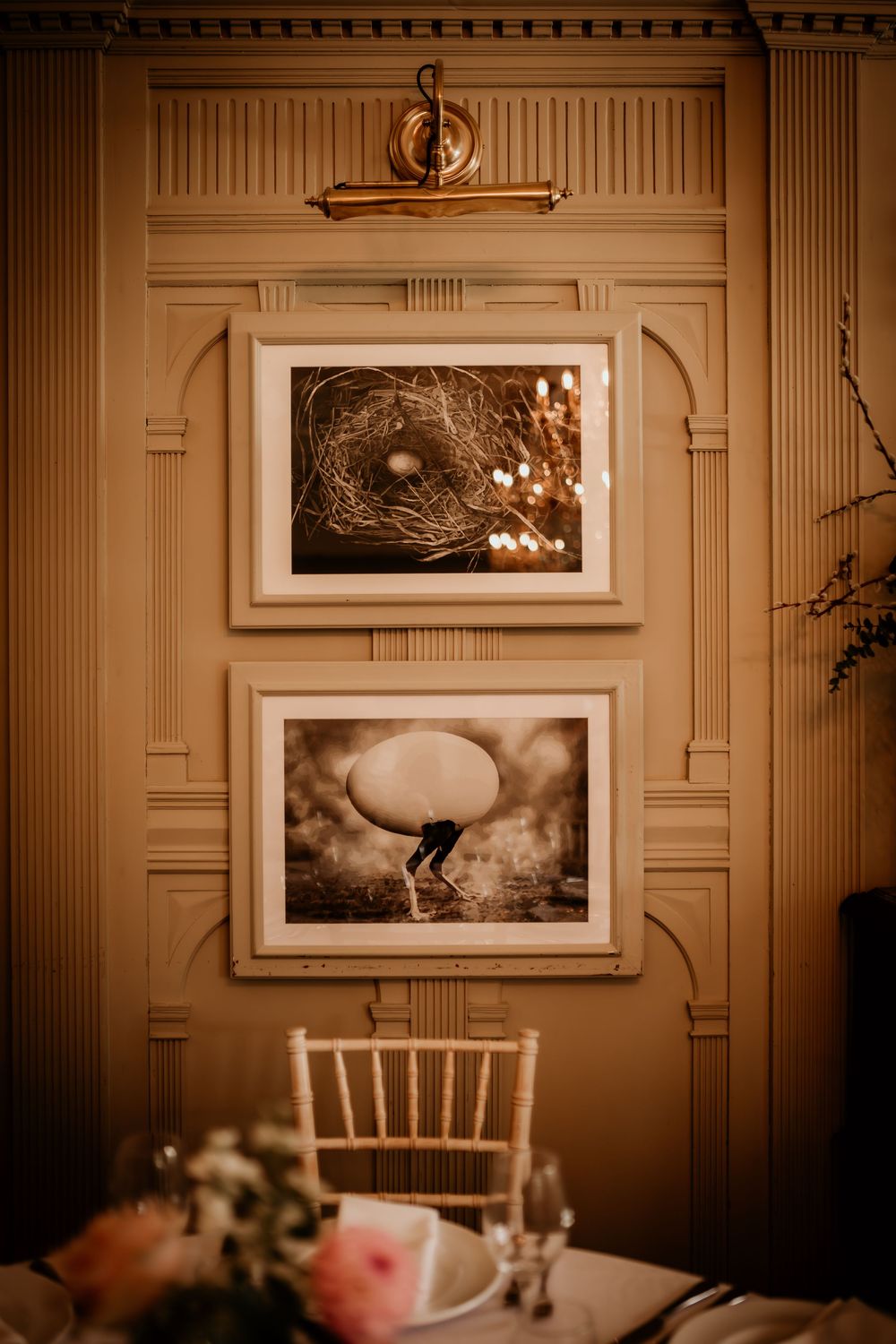 Vintage sepia-toned fine art photo collage showing classic dining room interior with elegant wall frames and decor.