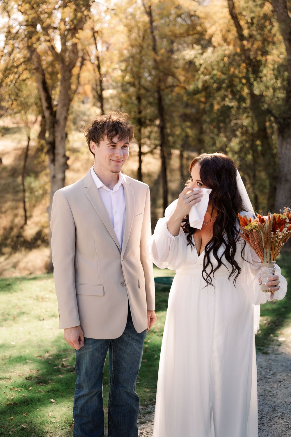 A couple shares intimate moments in a series of romantic outdoor photos with autumn scenery.