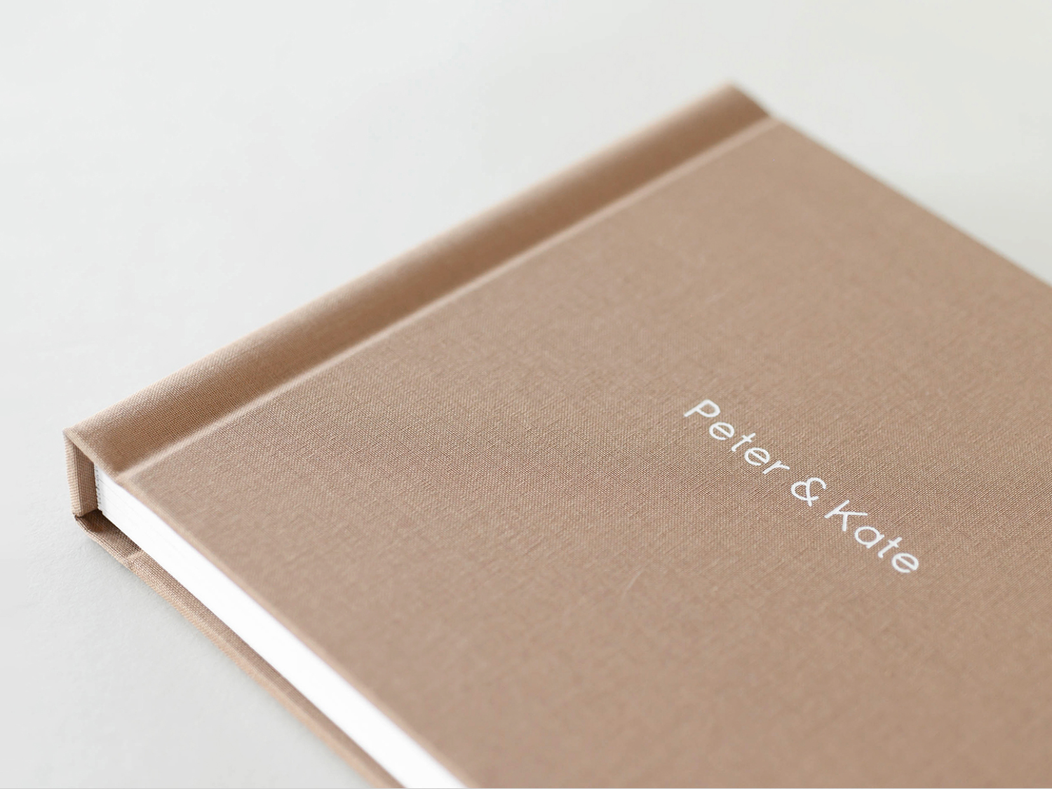 Layflat family photo album with thick pages and soft matte finish, designed for long-term keepsakes