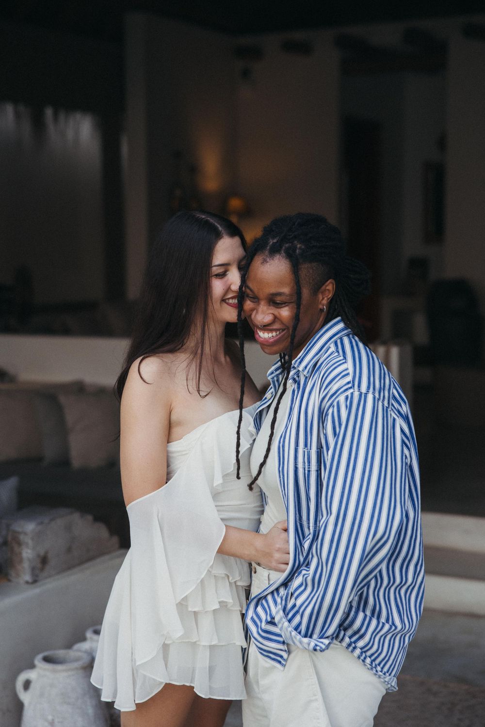 Two lovers share a joyful moment, at Hotel Tierra del Mar in Holbox Mexico