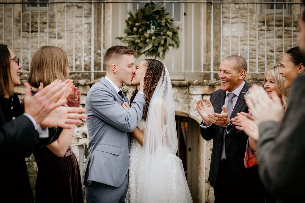 A series of wedding celebration moments showing joyful interactions between guests at an outdoor venue.