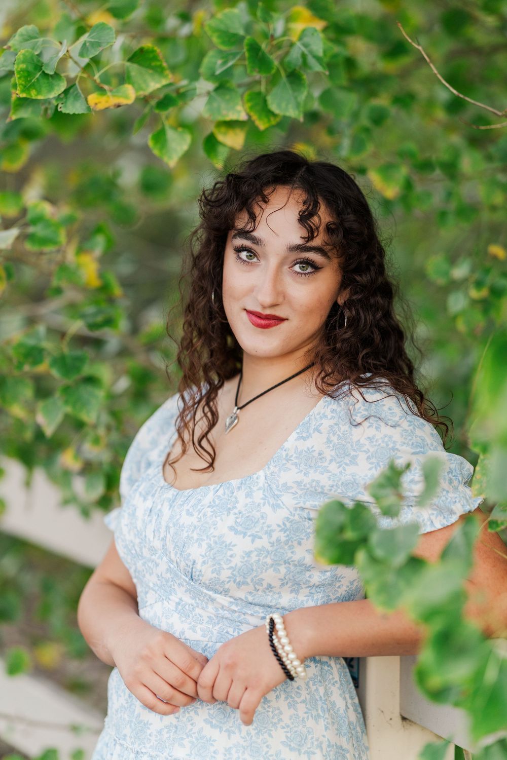 Senior photos in Ventura County with green hills