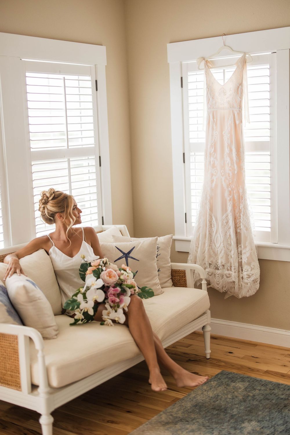 Four connected photos show a wedding dress hanging by windows and a person lounging on a white couch in a bright room.